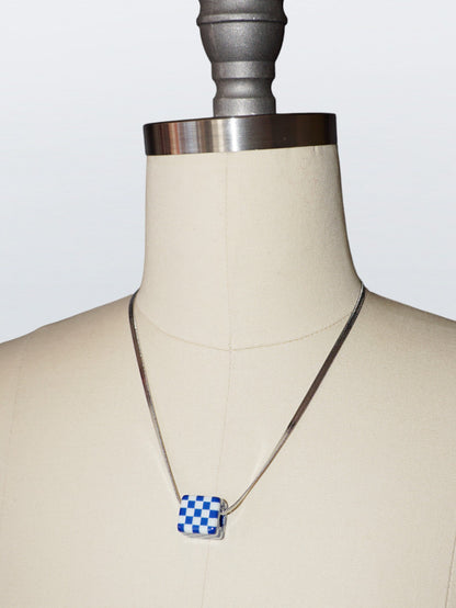 checkered dice necklace