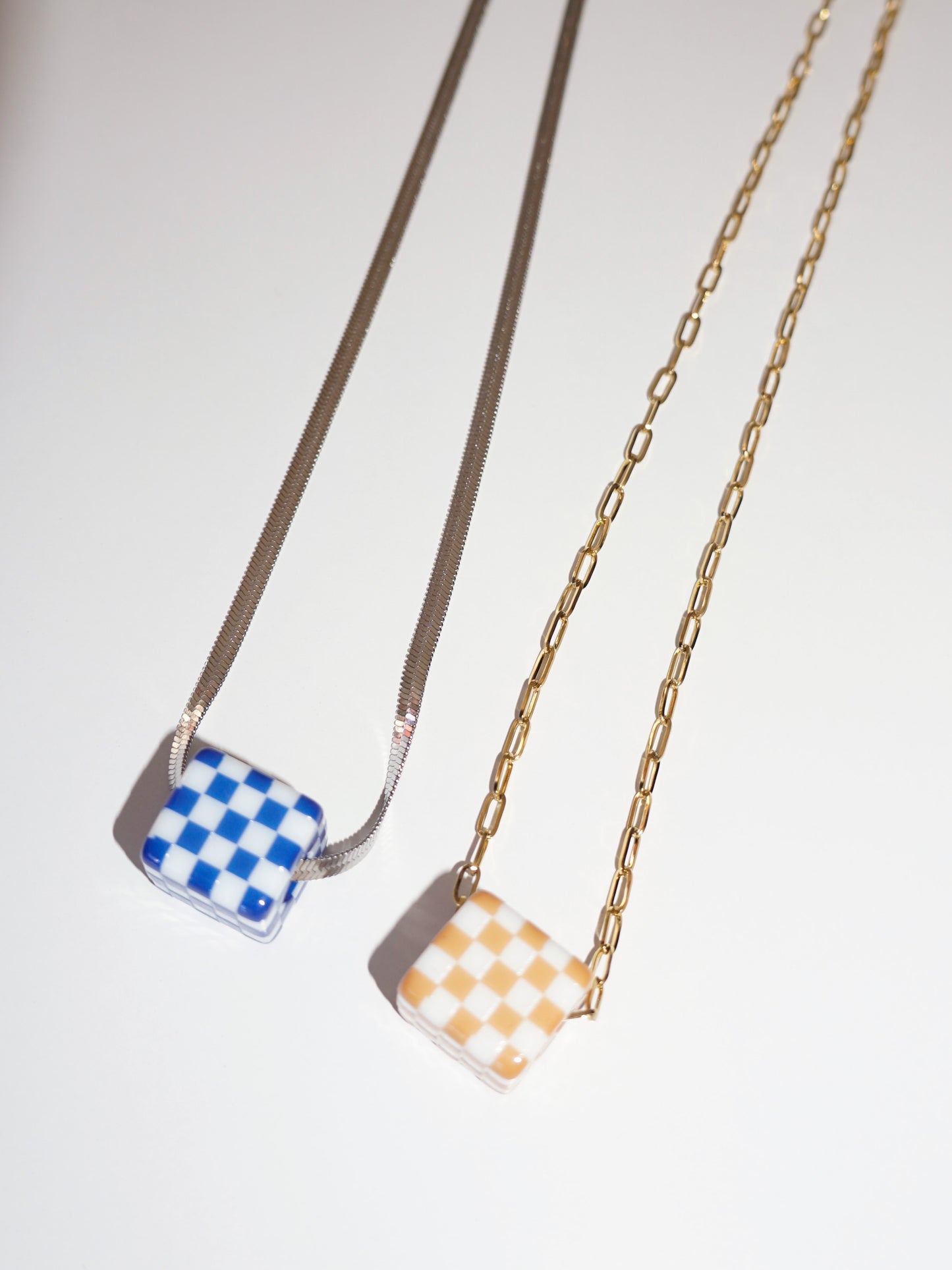 checkered dice necklace